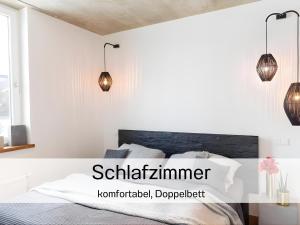 Ένα ή περισσότερα κρεβάτια σε δωμάτιο στο N8Quartier Eifel