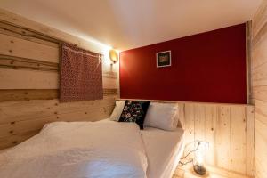 Postel nebo postele na pokoji v ubytování La Fabrique des Bauges