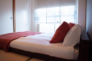 Ένα ή περισσότερα κρεβάτια σε δωμάτιο στο Howa Apt 303