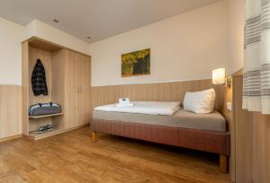 Postel nebo postele na pokoji v ubytování Gästehaus DEULA