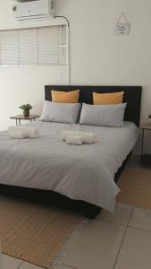 Ένα ή περισσότερα κρεβάτια σε δωμάτιο στο JeffersonGuest-House