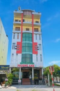 a tall building with a sign on it at Phương Anh 7 in Da Nang