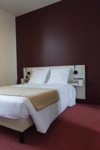 Postel nebo postele na pokoji v ubytování Cité Pontavice du Haras national du Pin + 12 fotografií