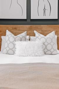 Кровать или кровати в номере 'Just Beachy' Muizenberg Beach Apartment