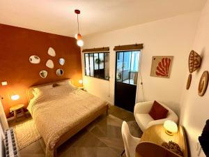 Postel nebo postele na pokoji v ubytování Le Sienna - Centre ville et gare