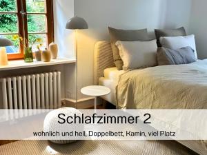 Postel nebo postele na pokoji v ubytování N2Quartier