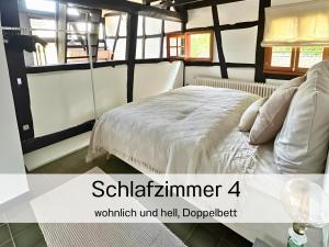 Postel nebo postele na pokoji v ubytování N2Quartier