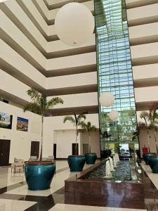 Khu vực ghế ngồi tại Uberlândia Suítes Hotel +32 ảnh