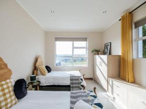 Ένα ή περισσότερα κρεβάτια σε δωμάτιο στο Canterburg stables