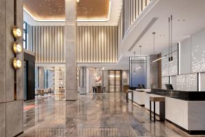 Ο χώρος του λόμπι ή της ρεσεψιόν στο Hilton Garden Inn Zhengzhou Xinzheng International Airport