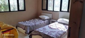 Ένα ή περισσότερα κρεβάτια σε δωμάτιο στο استراحة الباشا albash farm stay