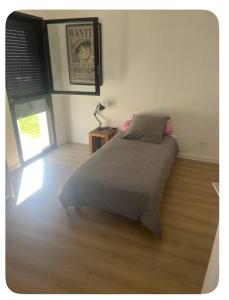 Ένα ή περισσότερα κρεβάτια σε δωμάτιο στο Chez Jorge