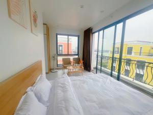 Postel nebo postele na pokoji v ubytování HAHA'S Home