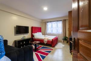 Postel nebo postele na pokoji v ubytování Burgundy Studio with free WI-FI