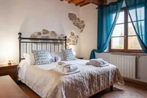 Postel nebo postele na pokoji v ubytování Villa Tiberini Wine Relais + 204 fotografií