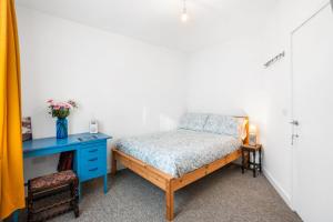 Voodi või voodid majutusasutuse Brighton Seaside Stay – Modern Home with Patio & Balcony toas