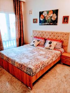 Postel nebo postele na pokoji v ubytování Cléopâtre housse sousse