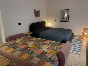 Postel nebo postele na pokoji v ubytování Cit ma Bel Little gem by the Riverside