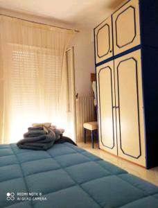 Ένα ή περισσότερα κρεβάτια σε δωμάτιο στο Casa Cristina City