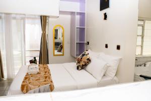 Postel nebo postele na pokoji v ubytování Rio Eco Gardens Hotel + 8 fotografií