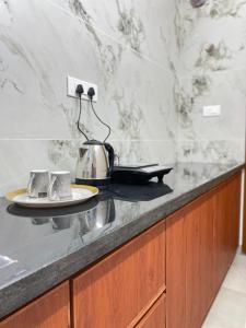 Η κουζίνα ή μικρή κουζίνα στο KK Service