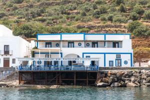 a building on a pier in the water at Da Nino sul mare Filicudi in Filicudi
