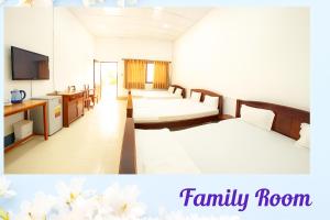 Postel nebo postele na pokoji v ubytování Khách Sạn Ngọc Hân + 61 fotografií