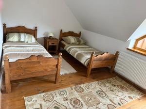 Ένα ή περισσότερα κρεβάτια σε δωμάτιο στο Chata Vločka - Orava Snow v lyžiarskom stredisku