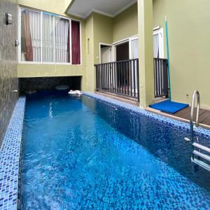 Πισίνα στο ή κοντά στο Griya Kania Arjuna