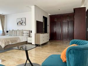 Ένα ή περισσότερα κρεβάτια σε δωμάτιο στο Imperial Grove 3BR at Cantonments