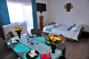 Postel nebo postele na pokoji v ubytování FLH - MIG Loft Sibiu