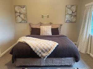 Ένα ή περισσότερα κρεβάτια σε δωμάτιο στο Riverslea on Farndon