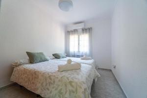 Ένα ή περισσότερα κρεβάτια σε δωμάτιο στο La Almunya de Tenerias