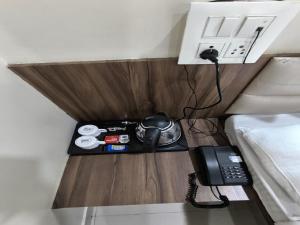 Postel nebo postele na pokoji v ubytování Hotel Krishna Exotica