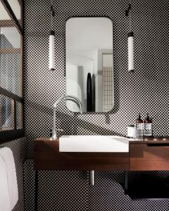 a bathroom with a sink and a mirror at Maison ELLE Paris in Paris