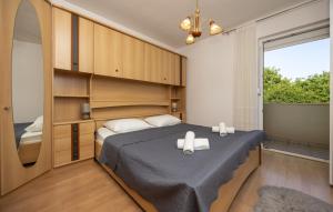 Ένα ή περισσότερα κρεβάτια σε δωμάτιο στο Holiday home Neda by Villas Guide +62 φωτογραφίες