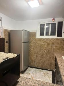 Kuchyň nebo kuchyňský kout v ubytování Riad Saadd