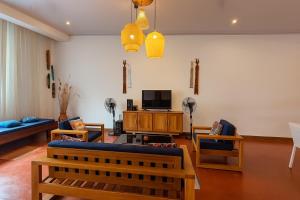 TV a/nebo společenská místnost v ubytování Villa Nosy