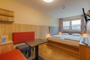 Ένα ή περισσότερα κρεβάτια σε δωμάτιο στο Schwedenhaus Wismar +59 φωτογραφίες