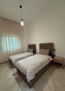 Ένα ή περισσότερα κρεβάτια σε δωμάτιο στο Charming apartment near airport