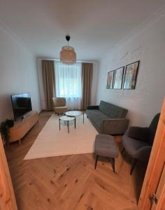 Televisyen dan/atau pusat hiburan di ApartHotel KODU