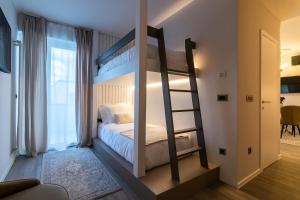 Postel nebo postele na pokoji v ubytování Beatrice - Boutique Apartments Resort + 169 fotografií