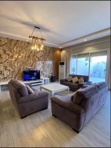 Posezení v ubytování فيلا ساحل القمر-درة العروس