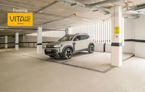 a car is parked in a parking garage at Vita Home Lanzarote I Deluxe Apartments in Arrecife