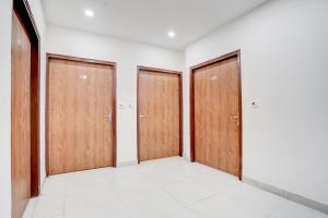 Ένα ή περισσότερα κρεβάτια σε δωμάτιο στο Townhouse Sarai Rohilla Railway Station Formerly Fortune Residency