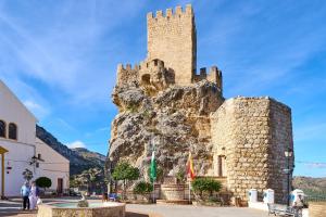 a castle on top of a mountain at Seralva Rural Zuheros in Zuheros