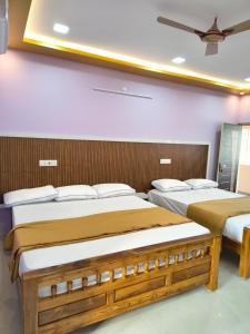 Postel nebo postele na pokoji v ubytování DS Guest House Rooms