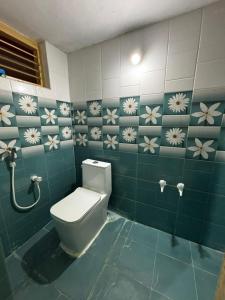 Ένα μπάνιο στο NPS Homestay