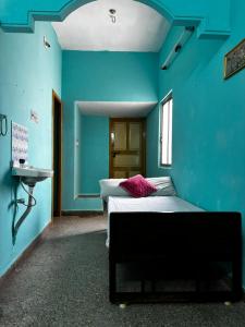 Ένα ή περισσότερα κρεβάτια σε δωμάτιο στο NPS Homestay +3 φωτογραφίες