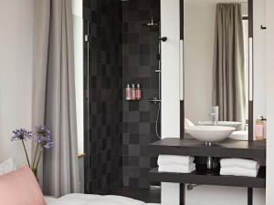 Koupelna v ubytování Numa Berlin Drift + 36 fotografií